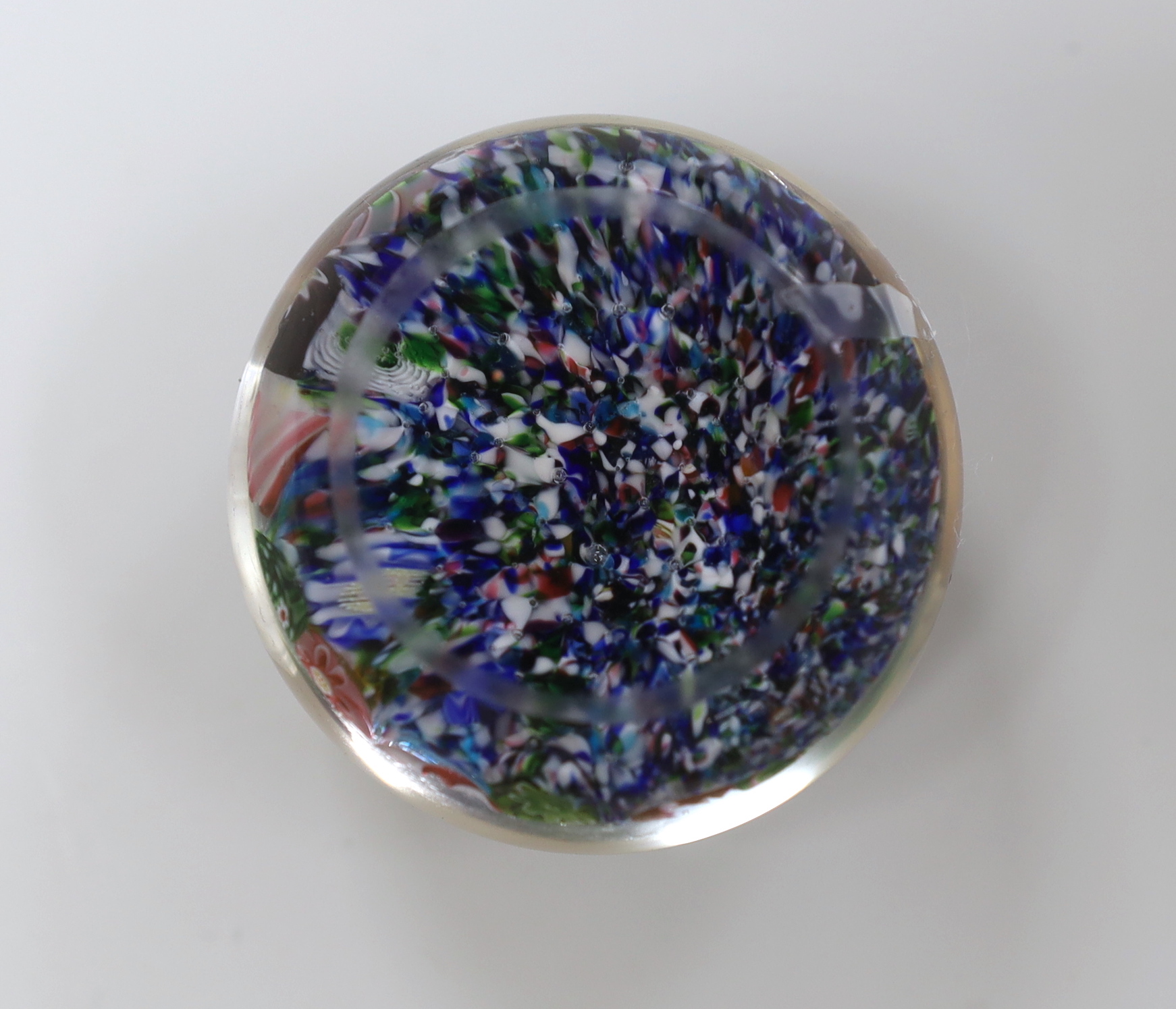 A Clichy scrambled cane paperweight, 5cm diameter